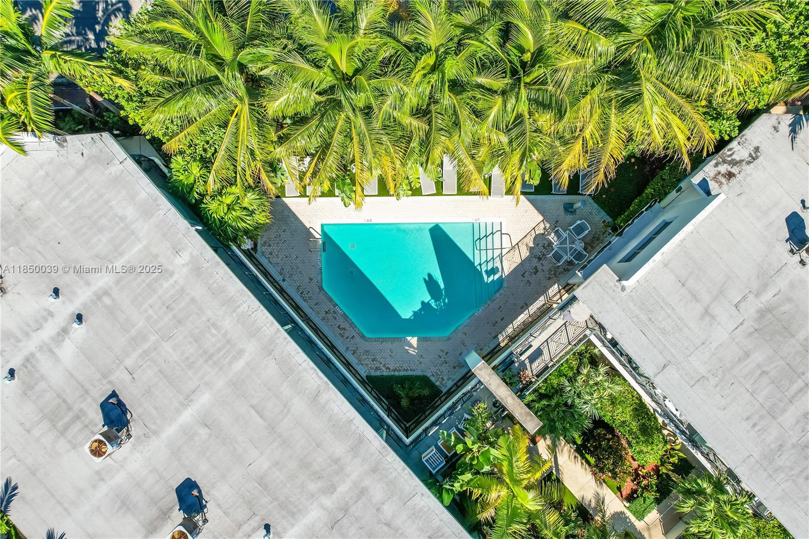 435 21st Street, Unit 322 Miami Beach, FL 33139 - Photo 27 of 41 a view of swimming pool with a yard