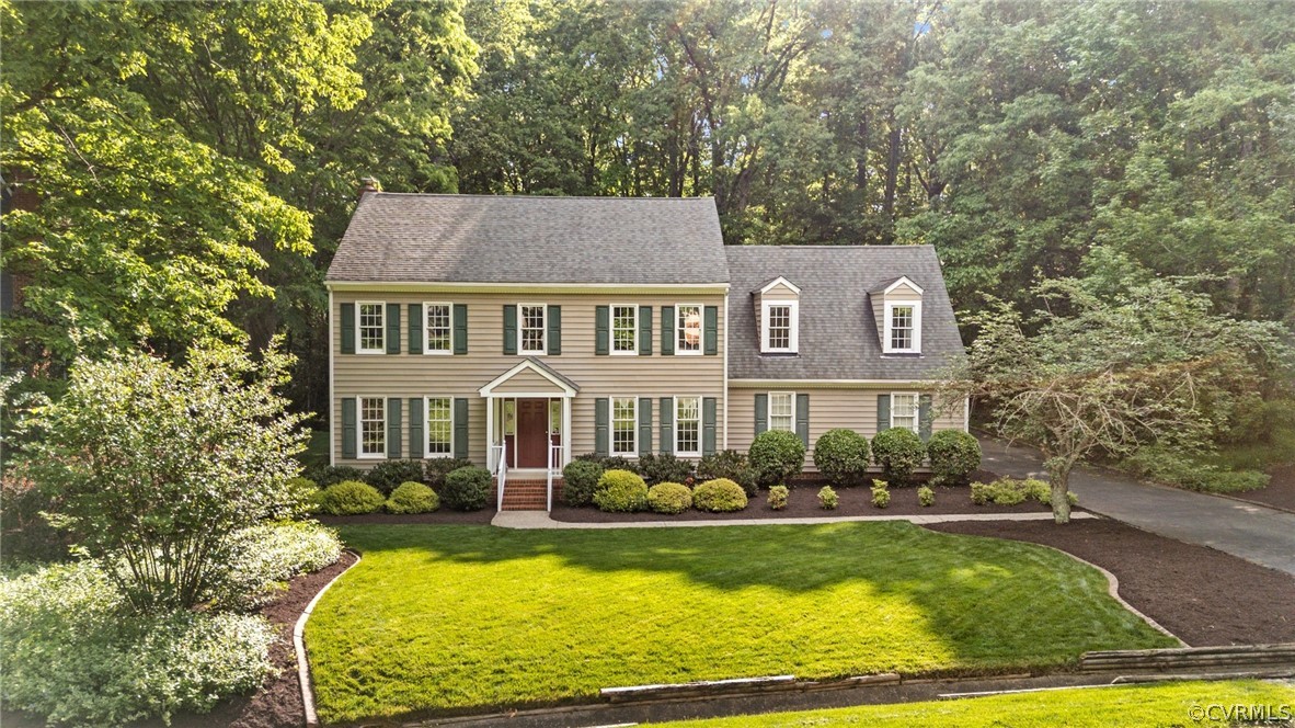 front view of a house with a yard
