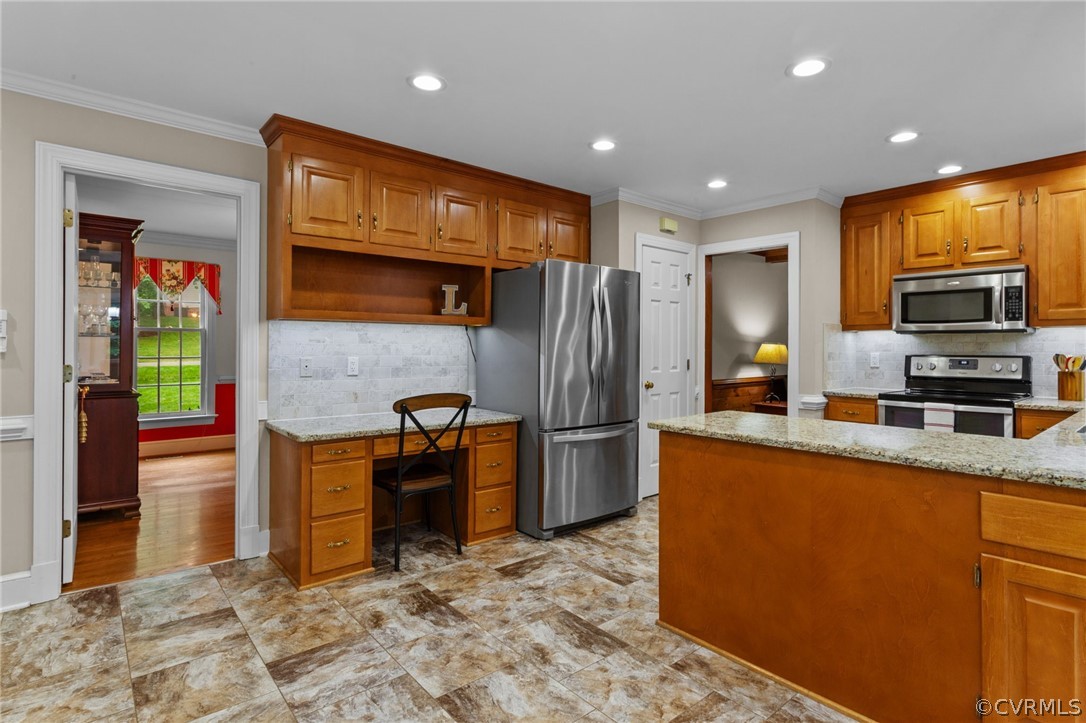 413 Lancey Drive Midlothian, VA 23114 - Photo 14 of 46 a kitchen with stainless steel appliances granite countertop a refrigerator and a stove