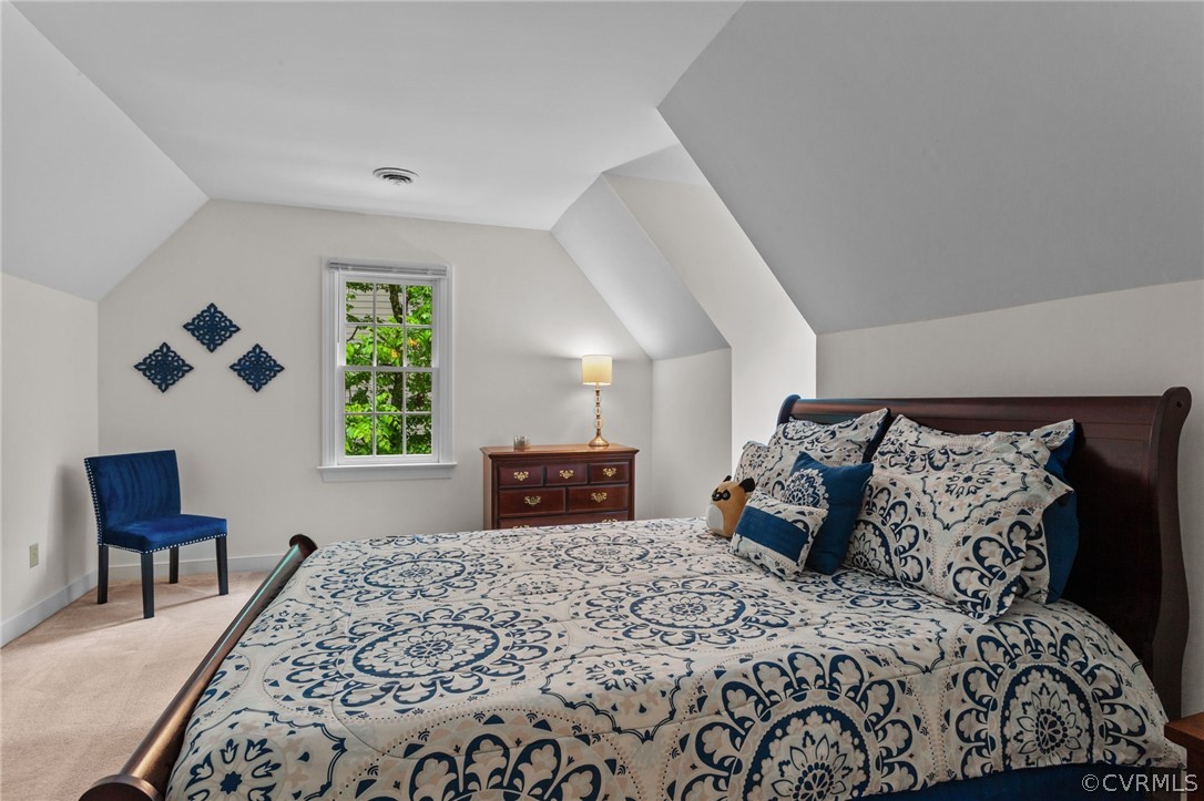 413 Lancey Drive Midlothian, VA 23114 - Photo 17 of 46 a bed sitting in a bedroom next to a window