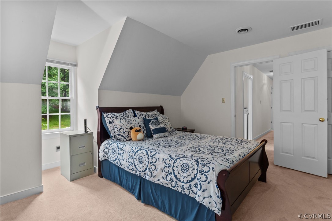 413 Lancey Drive Midlothian, VA 23114 - Photo 18 of 46 a bedroom with a bed and a window