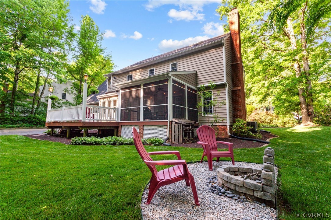 413 Lancey Drive Midlothian, VA 23114 - Photo 36 of 46 a backyard of a house with table and chairs