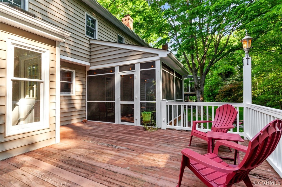 413 Lancey Drive Midlothian, VA 23114 - Photo 37 of 46 a view of a chair and table on the wooden deck