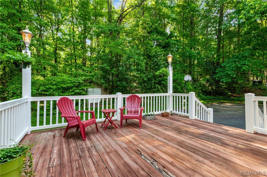 413 Lancey Drive Midlothian, VA 23114 - Photo 38 of 46 a view of a wooden deck with a bench