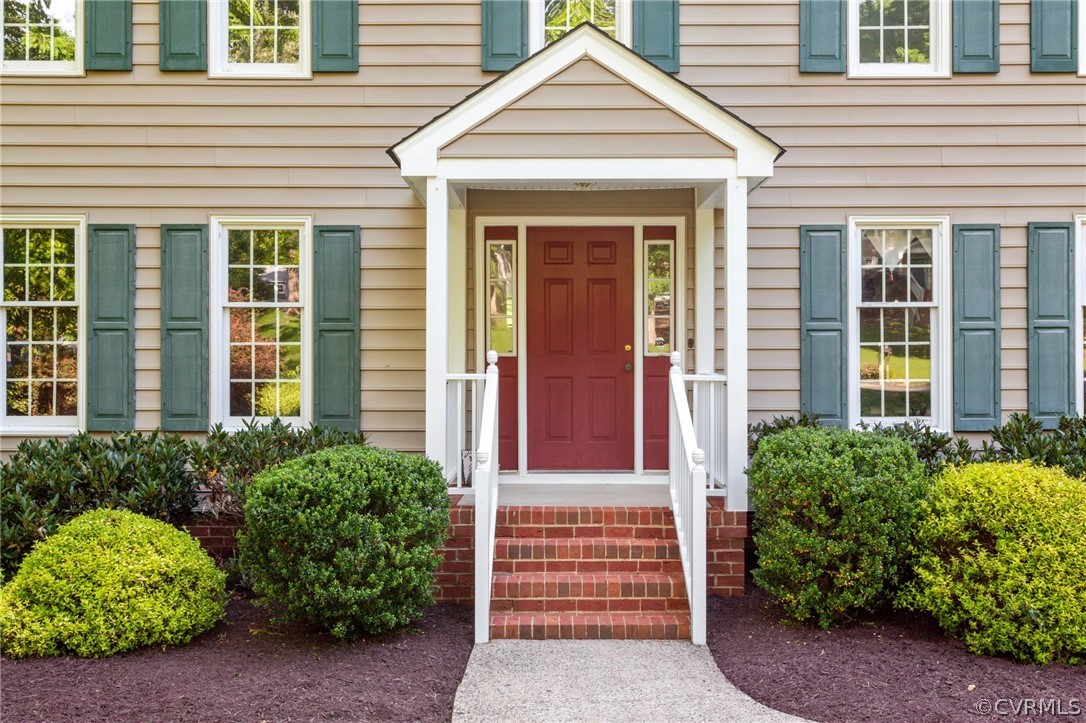 413 Lancey Drive Midlothian, VA 23114 - Photo 4 of 46 front view of a house with a small yard