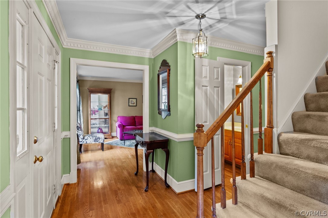 413 Lancey Drive Midlothian, VA 23114 - Photo 7 of 46 a living room with furniture and a wooden floor
