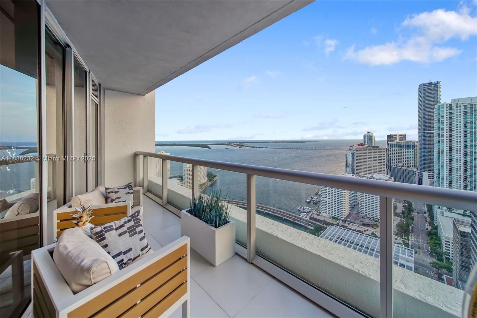 495 Brickell Avenue, Unit 4209 Miami, FL 33131 - Photo 11 of 37 a view of living room with furniture and wooden floor