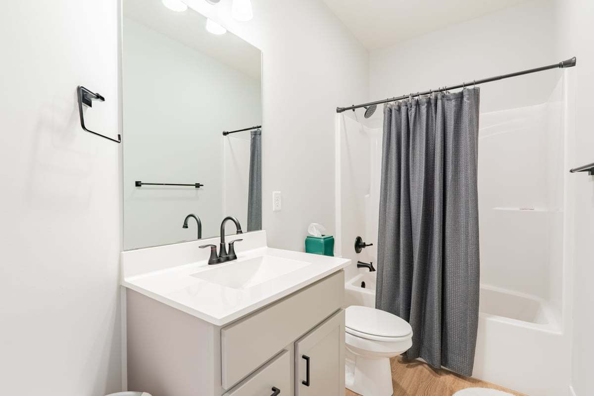 1809 Glenbridge Road Bloomington, IL 61704 - Photo 13 of 23 a bathroom with a sink a toilet and shower