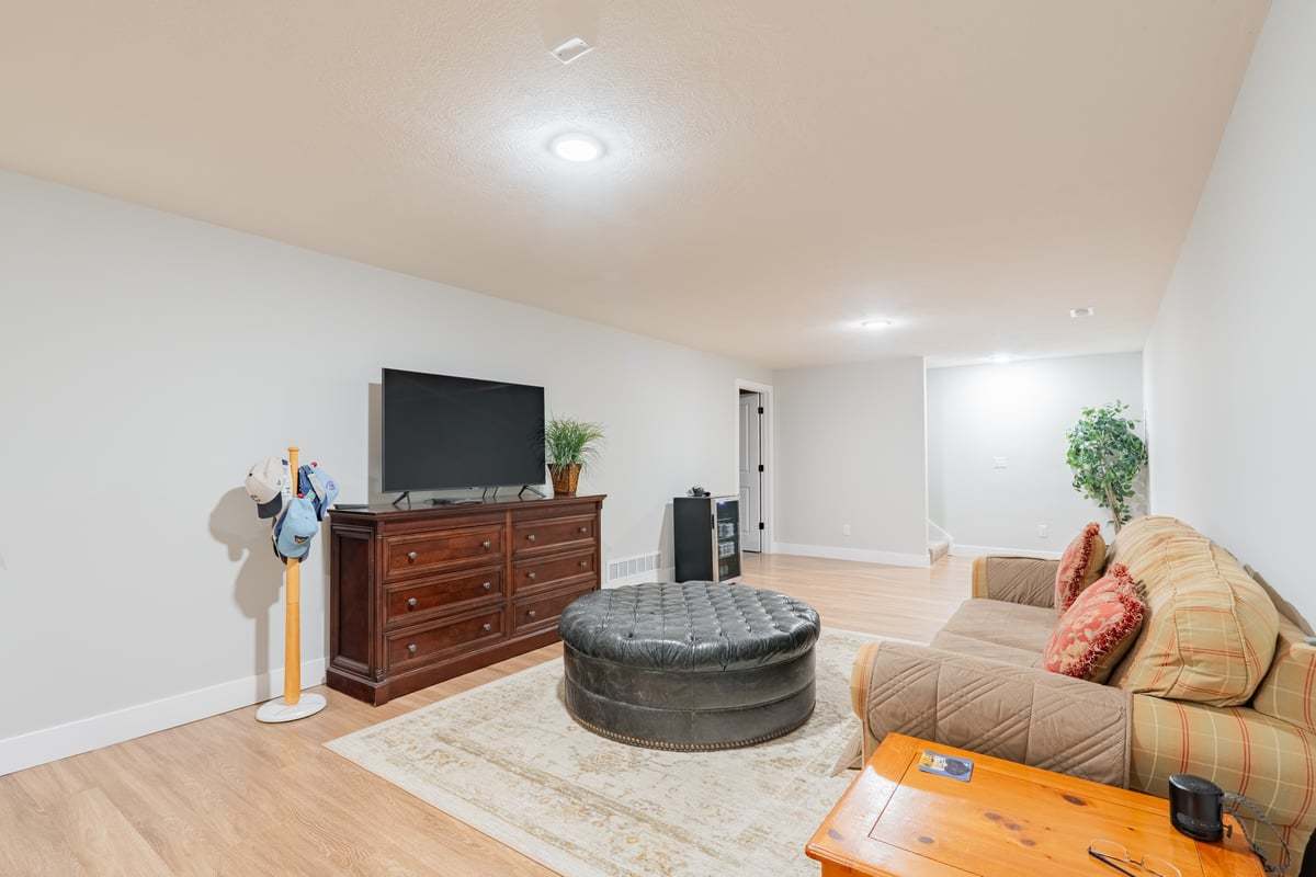 1809 Glenbridge Road Bloomington, IL 61704 - Photo 15 of 23 a living room with furniture and a flat screen tv