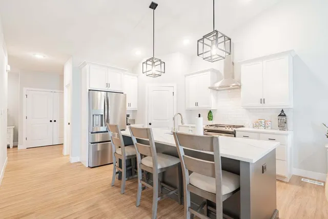 a view of dining table and chairs