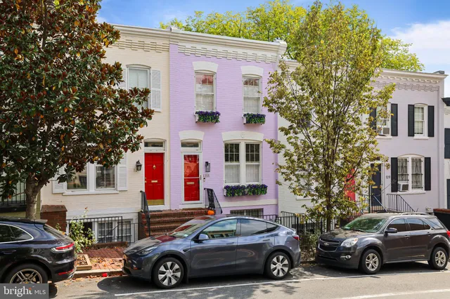 a car parked in front of a house