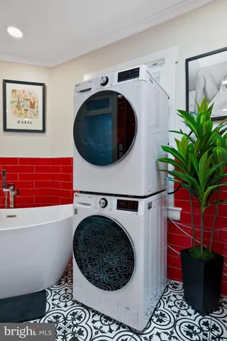 a utility room with dryer and washer