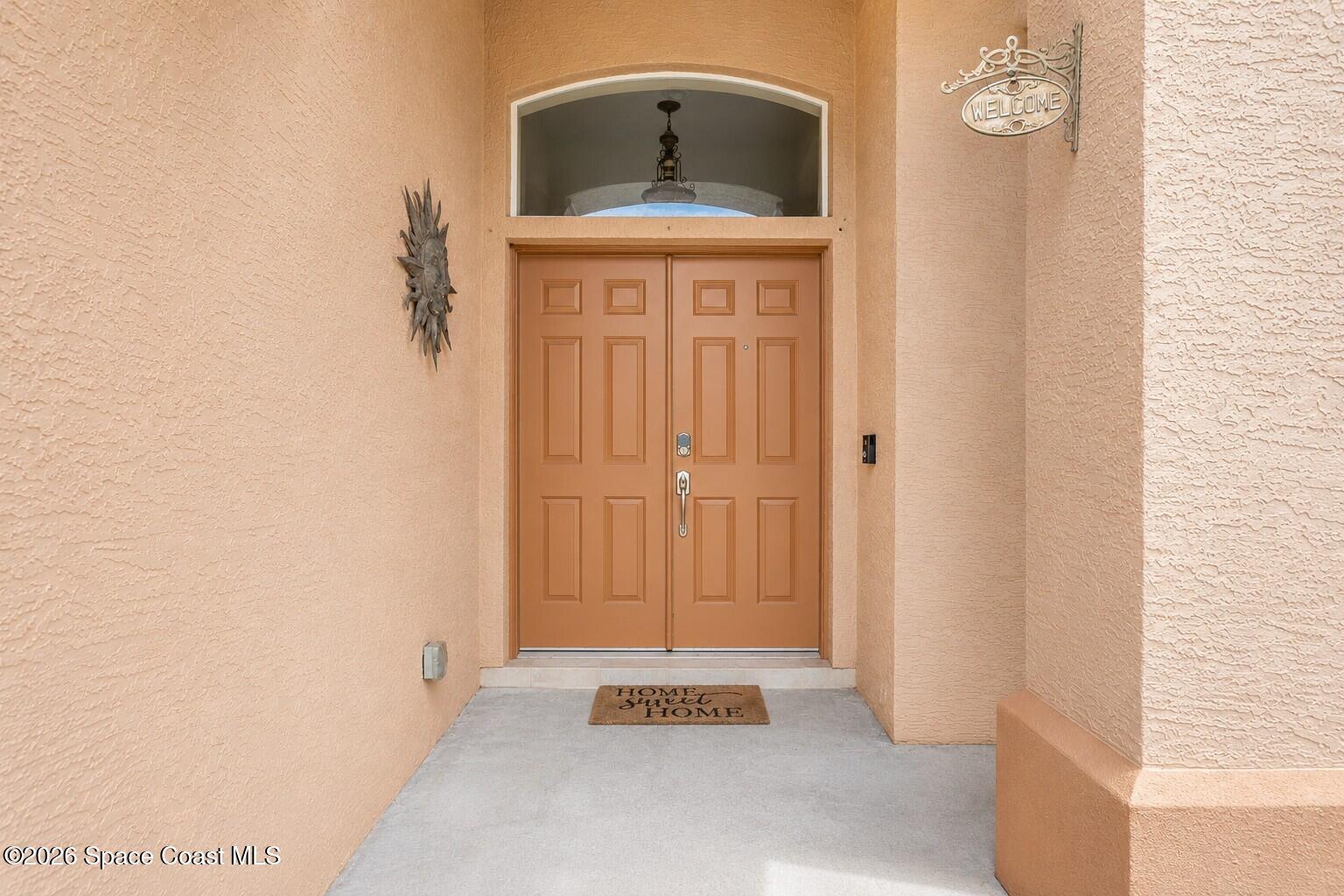 1697 Atrium Drive Melbourne, FL 32935 - Photo 3 of 36 Front Door