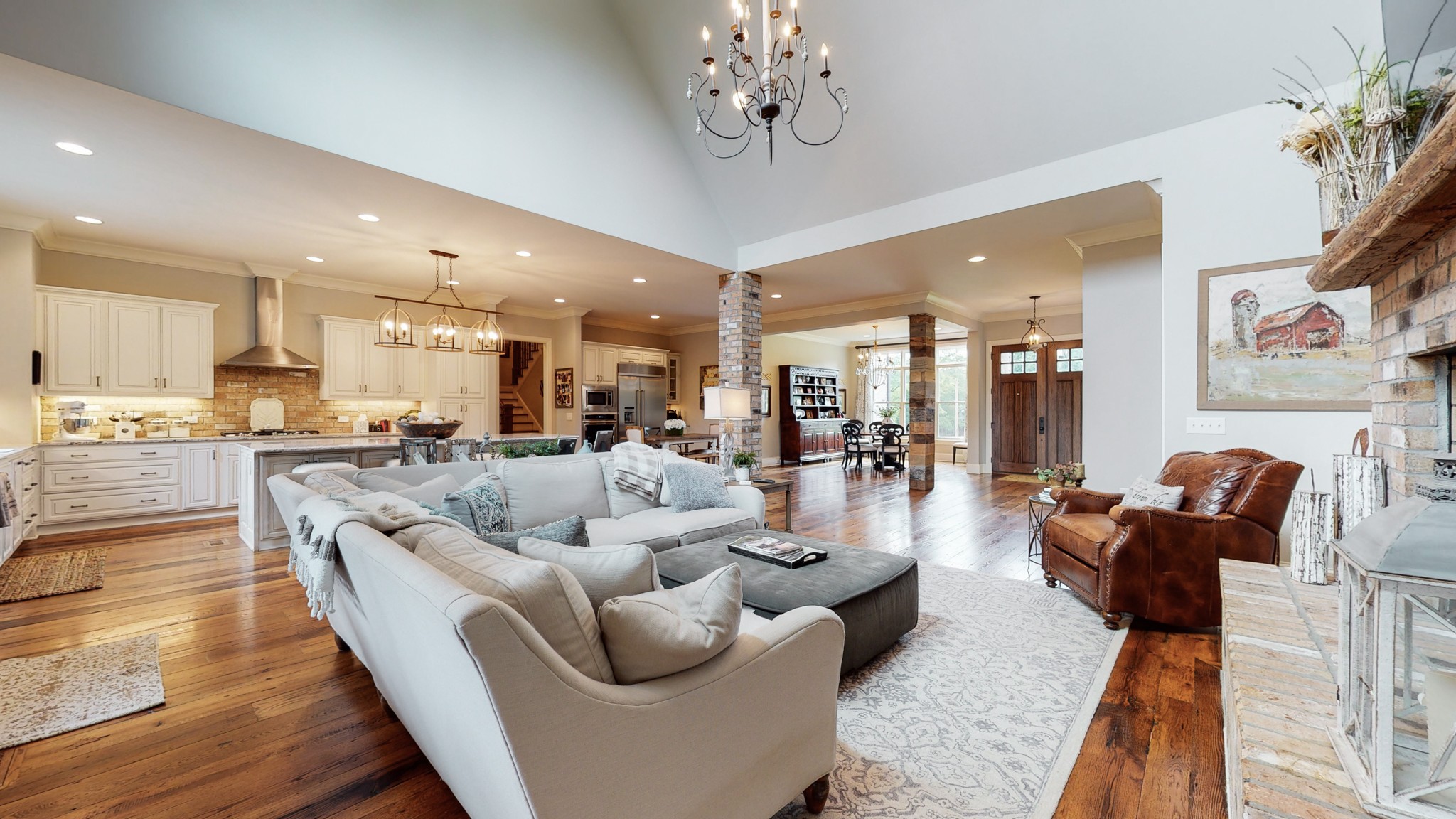 1110 Ridgeway Drive Franklin, TN 37067 - Photo 13 of 48 a living room with furniture kitchen and a chandelier
