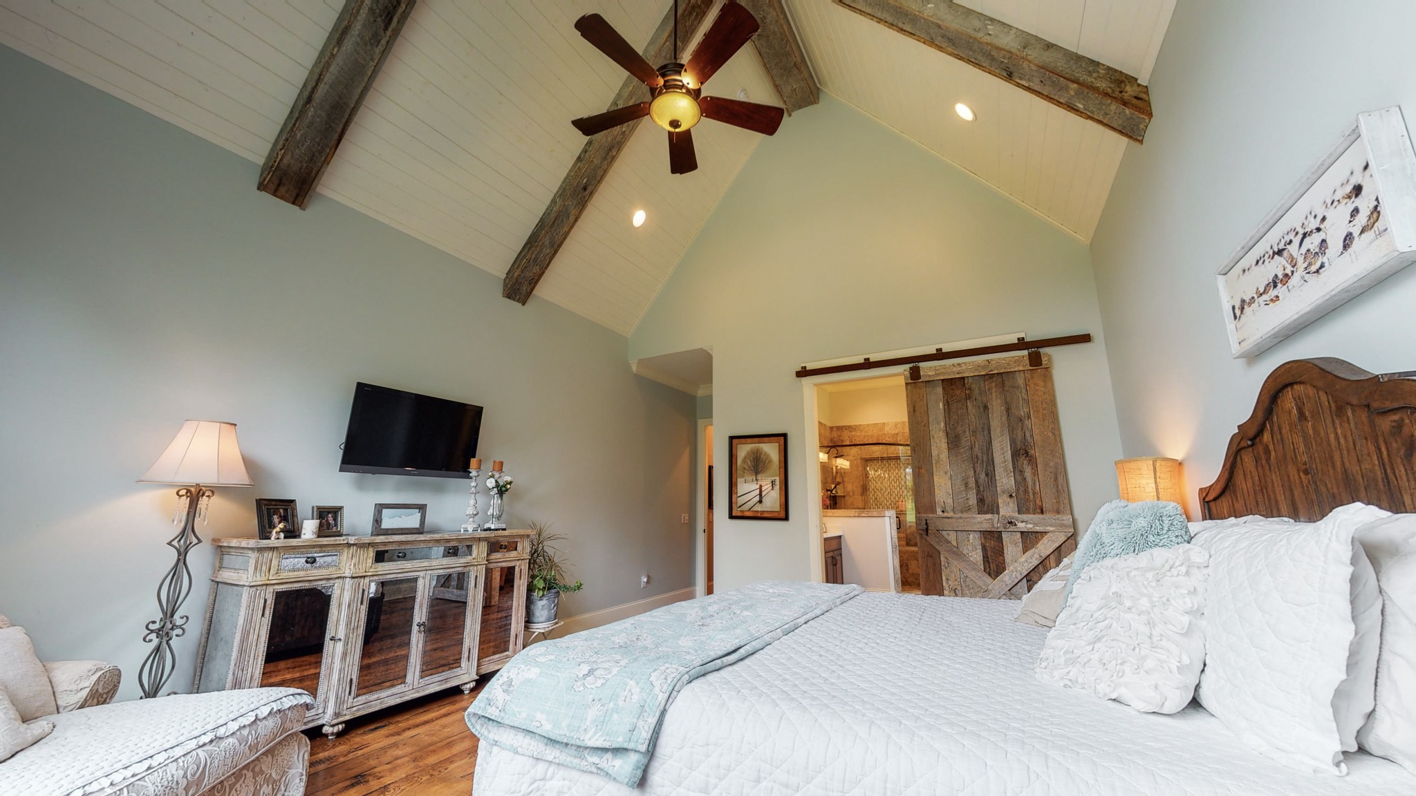 1110 Ridgeway Drive Franklin, TN 37067 - Photo 18 of 48 a bedroom with a bed and a flat screen tv