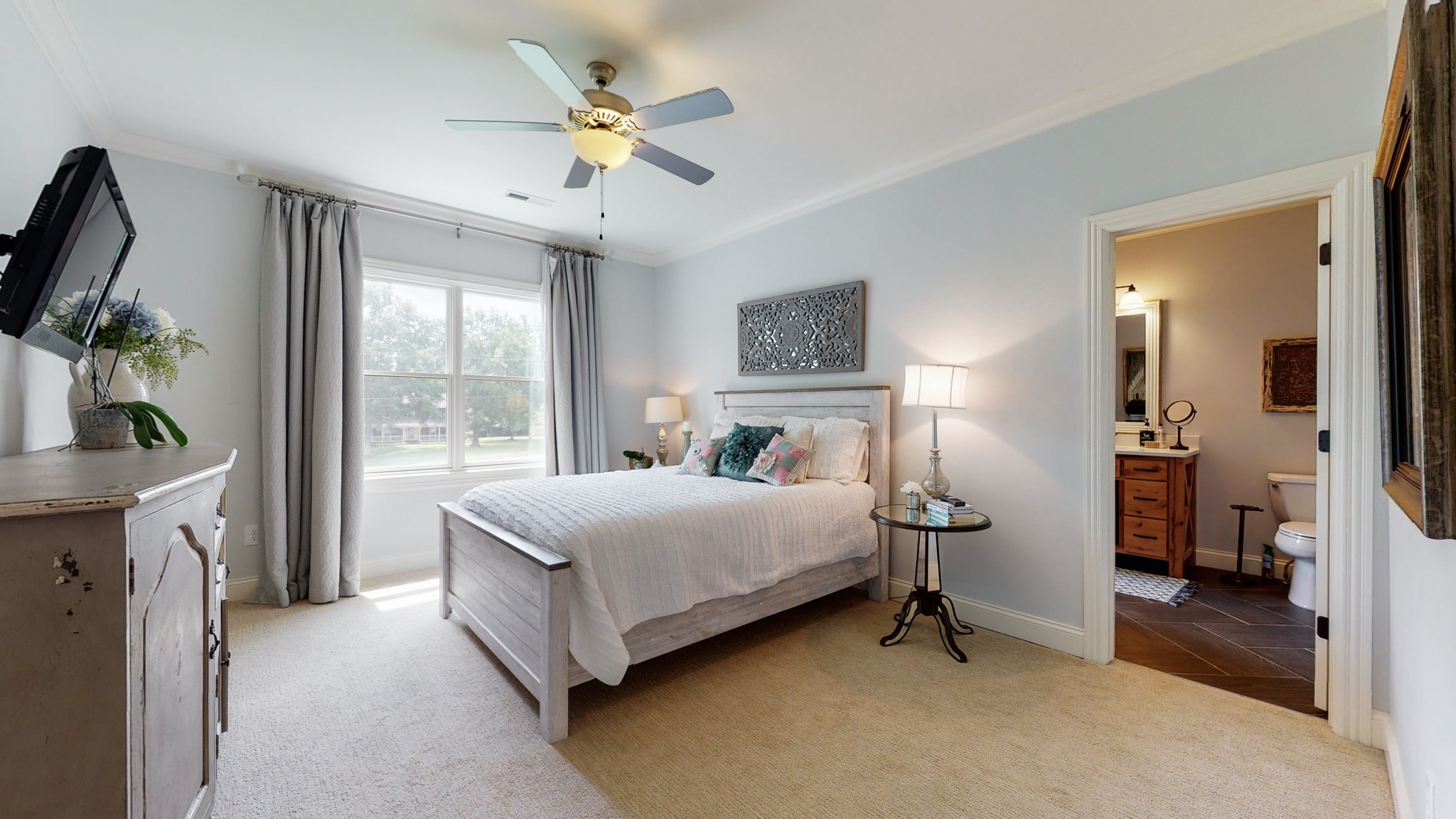 1110 Ridgeway Drive Franklin, TN 37067 - Photo 30 of 48 a bedroom with a bed and a chandelier