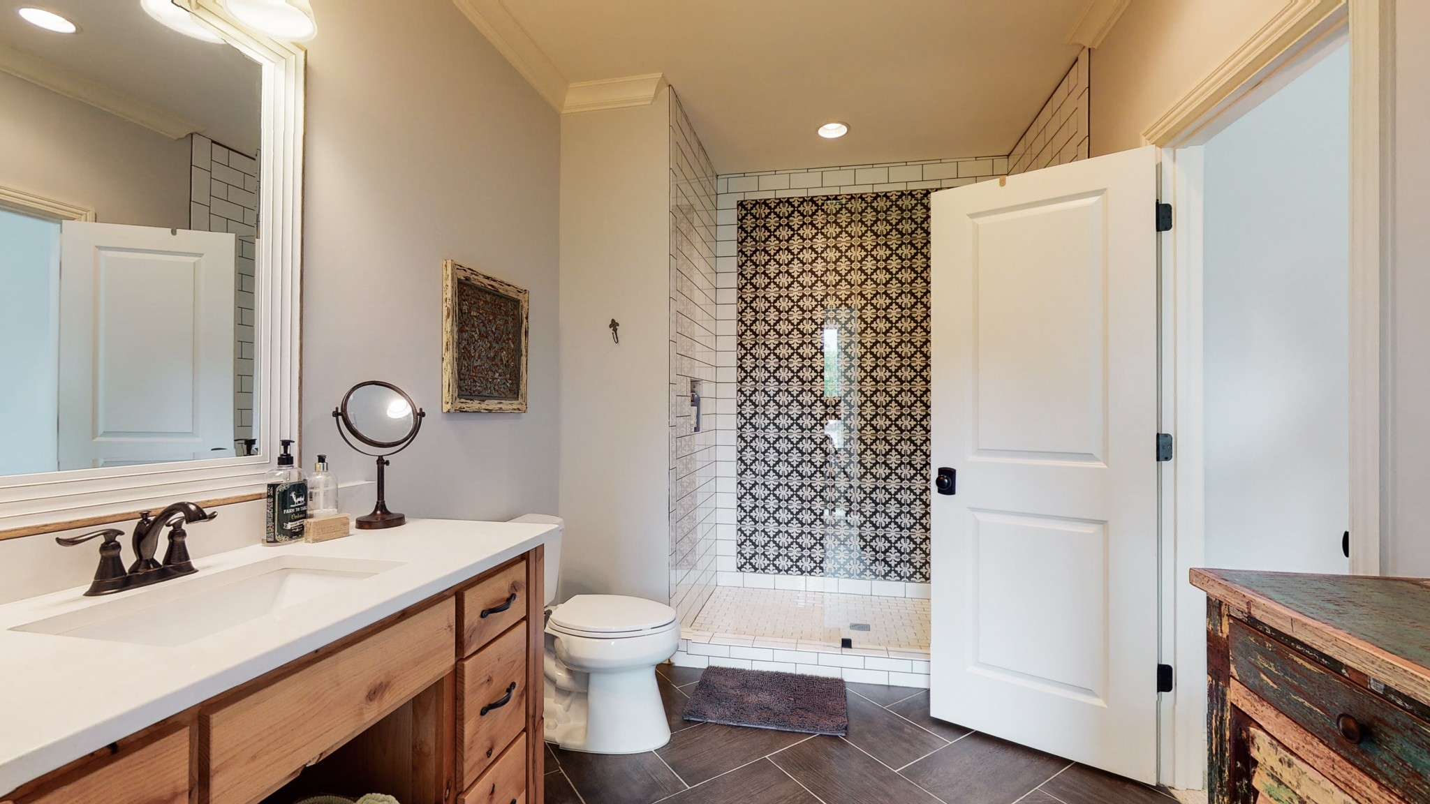 1110 Ridgeway Drive Franklin, TN 37067 - Photo 33 of 48 a bathroom with a granite countertop sink toilet and shower