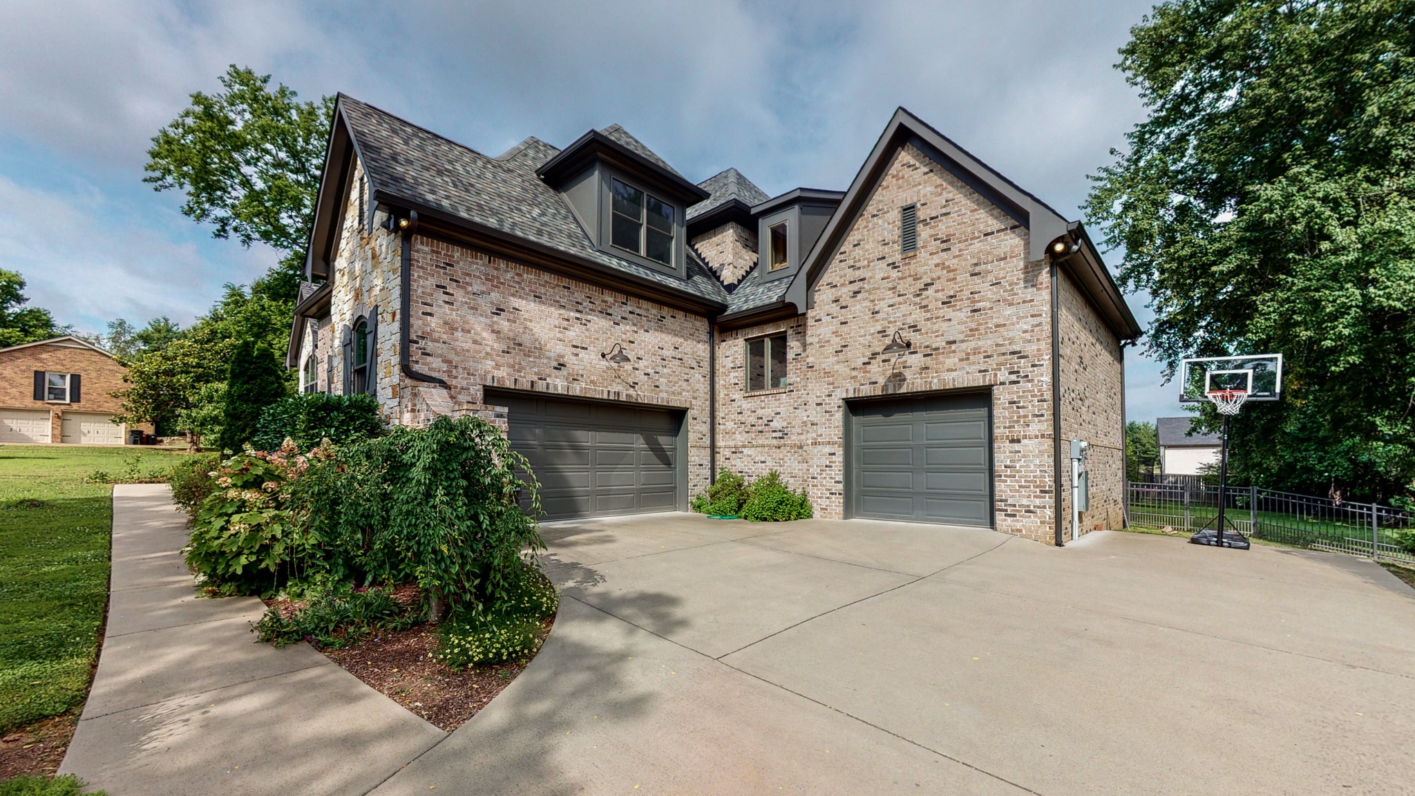 1110 Ridgeway Drive Franklin, TN 37067 - Photo 36 of 48 a front view of a house with yard and trees