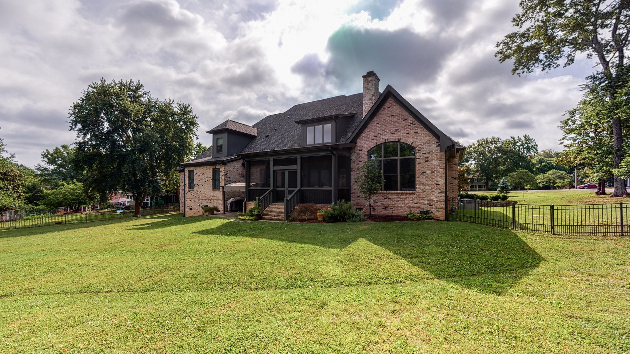 1110 Ridgeway Drive Franklin, TN 37067 - Photo 39 of 48 a view of a house with a big yard and large trees