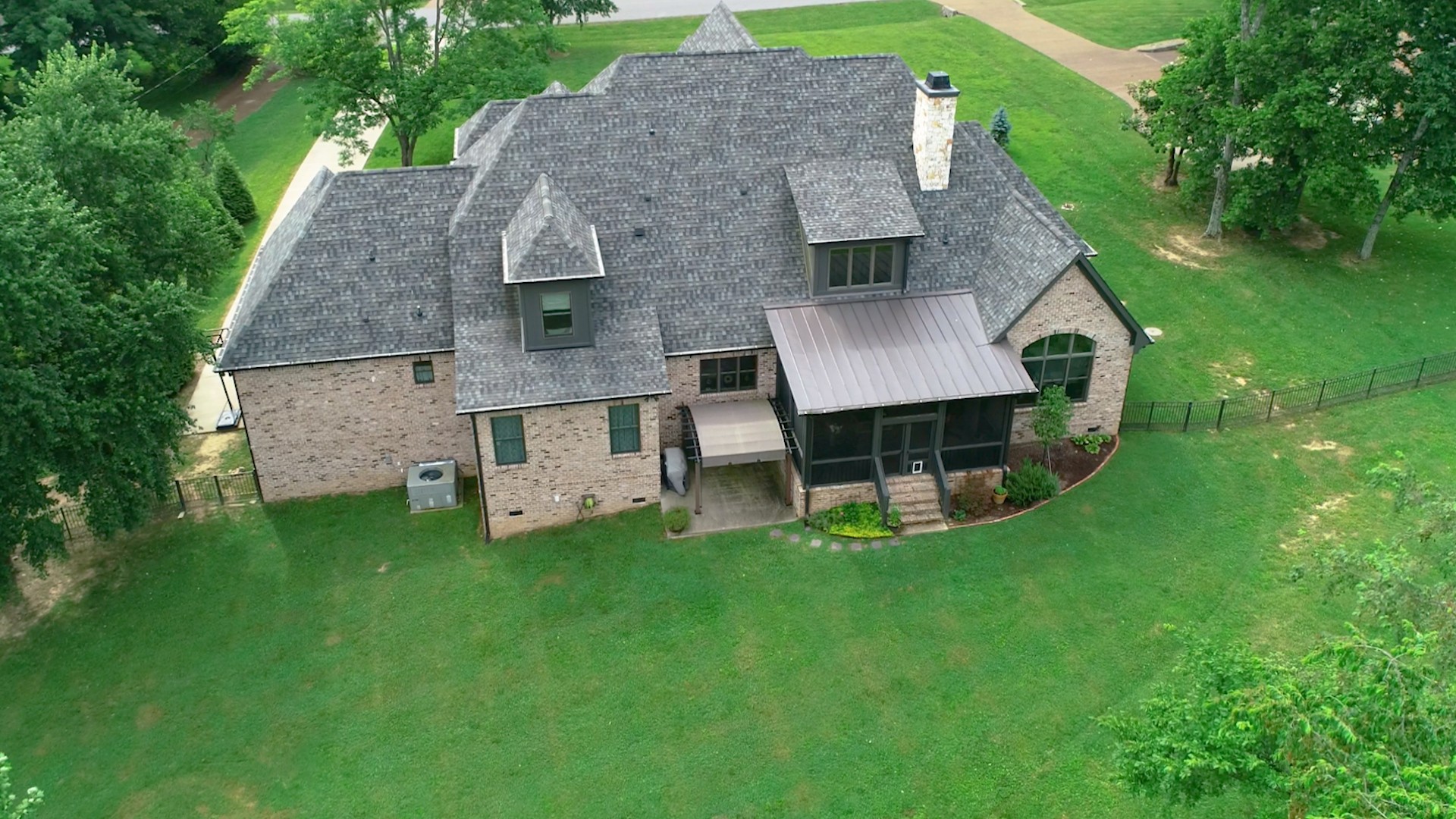 1110 Ridgeway Drive Franklin, TN 37067 - Photo 47 of 48 an aerial view of a house with a garden and deck