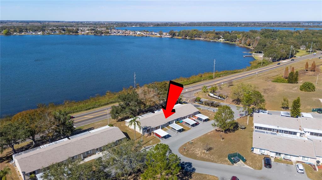 205 Winter Ridge Boulevard Winter Haven, FL 33881 - Photo 30 of 36 an aerial view of a house with a garden