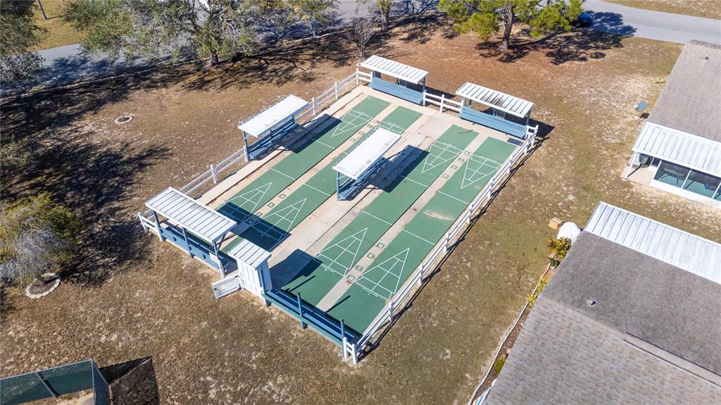 205 Winter Ridge Boulevard Winter Haven, FL 33881 - Photo 31 of 36 an aerial view of a house with a yard