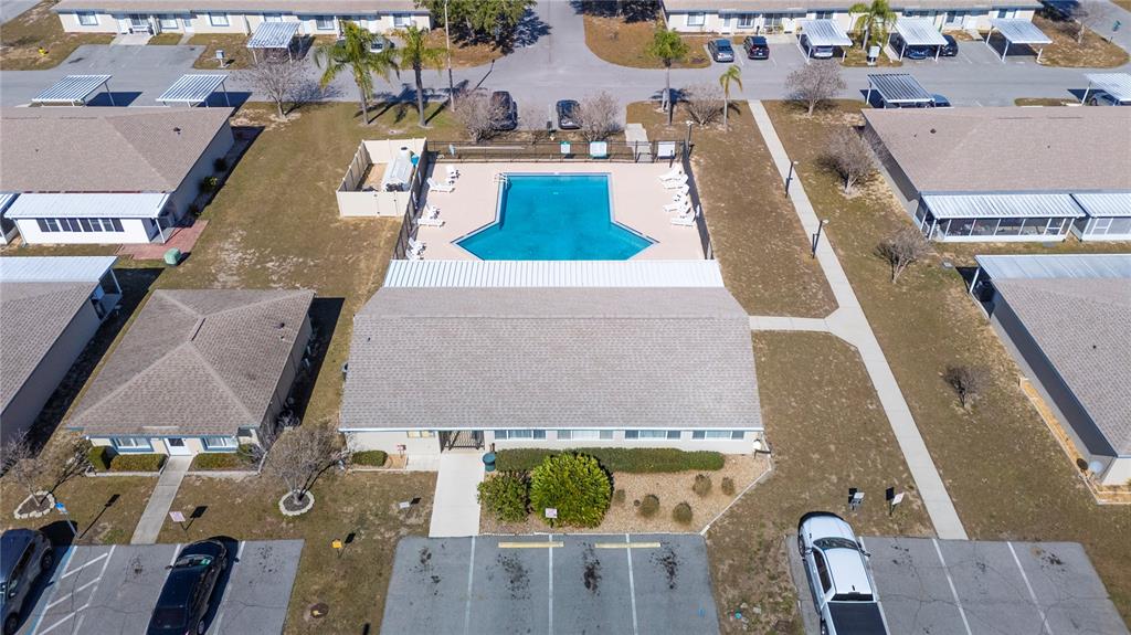 205 Winter Ridge Boulevard Winter Haven, FL 33881 - Photo 32 of 36 an aerial view of a house with a yard