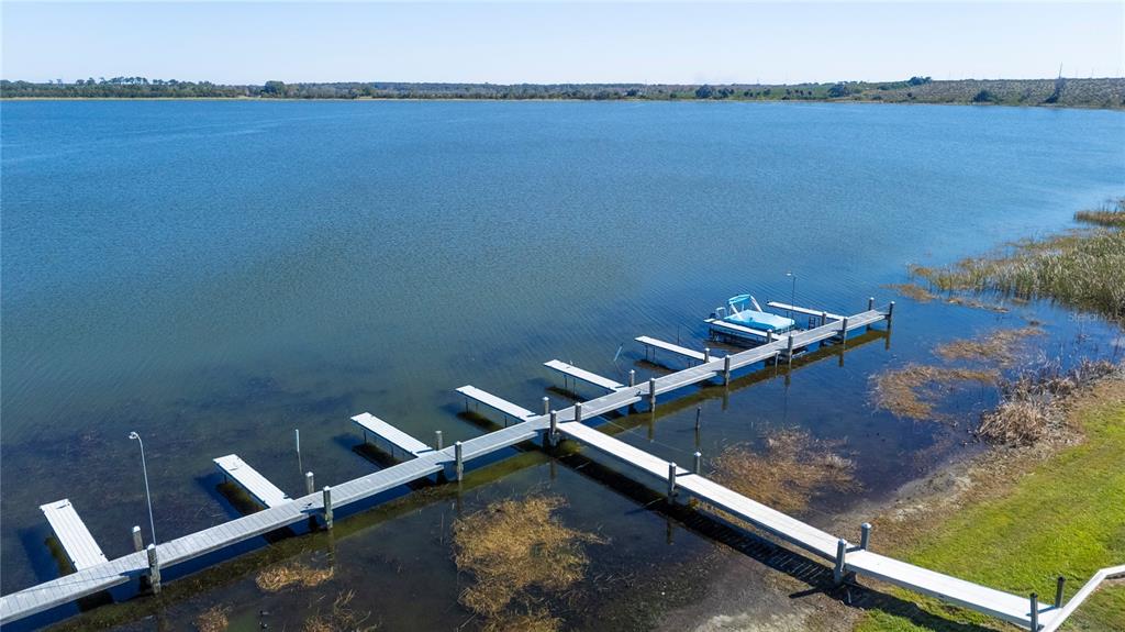 205 Winter Ridge Boulevard Winter Haven, FL 33881 - Photo 36 of 36 wooden floor with boat