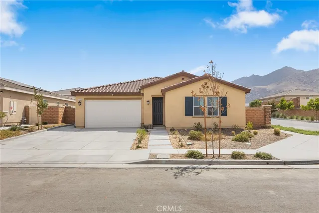 a front view of a house with a patio