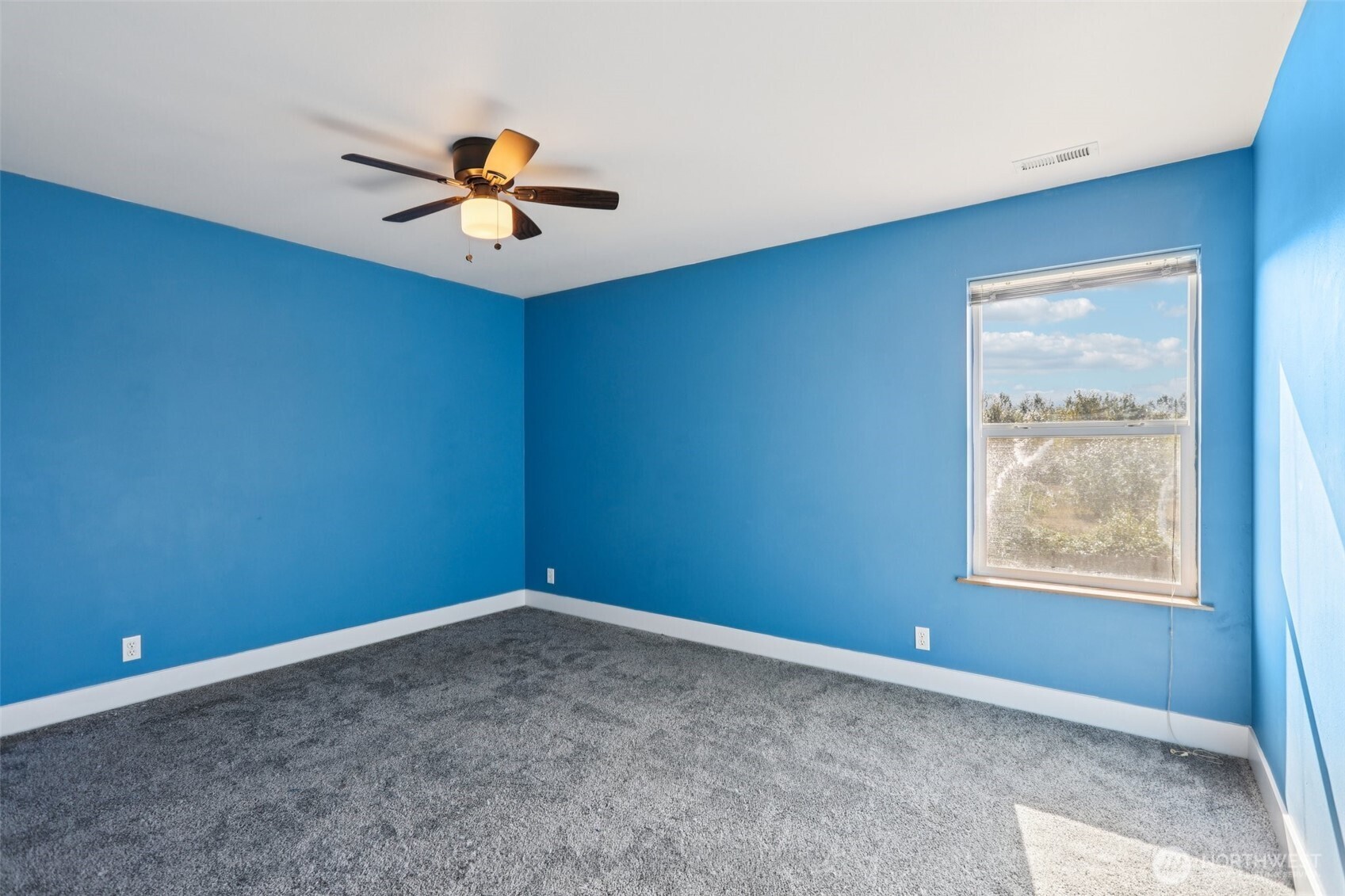 114 Weaver Street Northeast Orting, WA 98360 - Photo 24 of 40 an empty room with a window