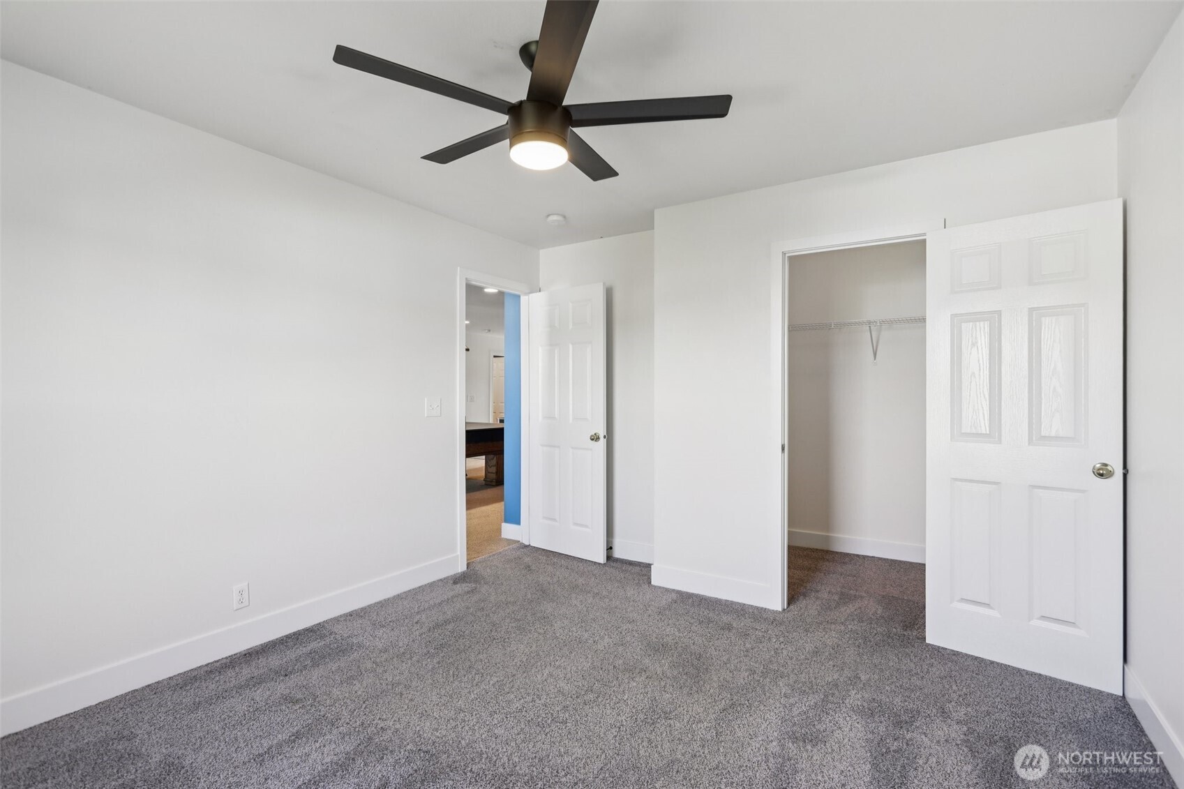 114 Weaver Street Northeast Orting, WA 98360 - Photo 30 of 40 wooden floor in an empty room