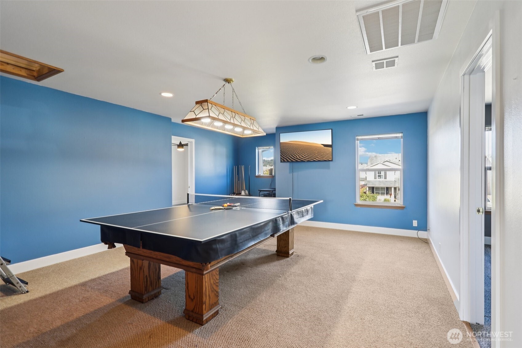 114 Weaver Street Northeast Orting, WA 98360 - Photo 32 of 40 a room with pool table and a window