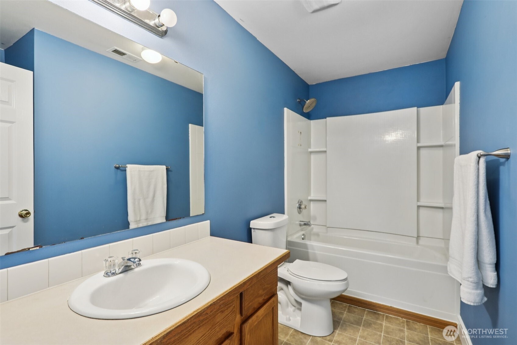 114 Weaver Street Northeast Orting, WA 98360 - Photo 33 of 40 a bathroom with a sink toilet and shower