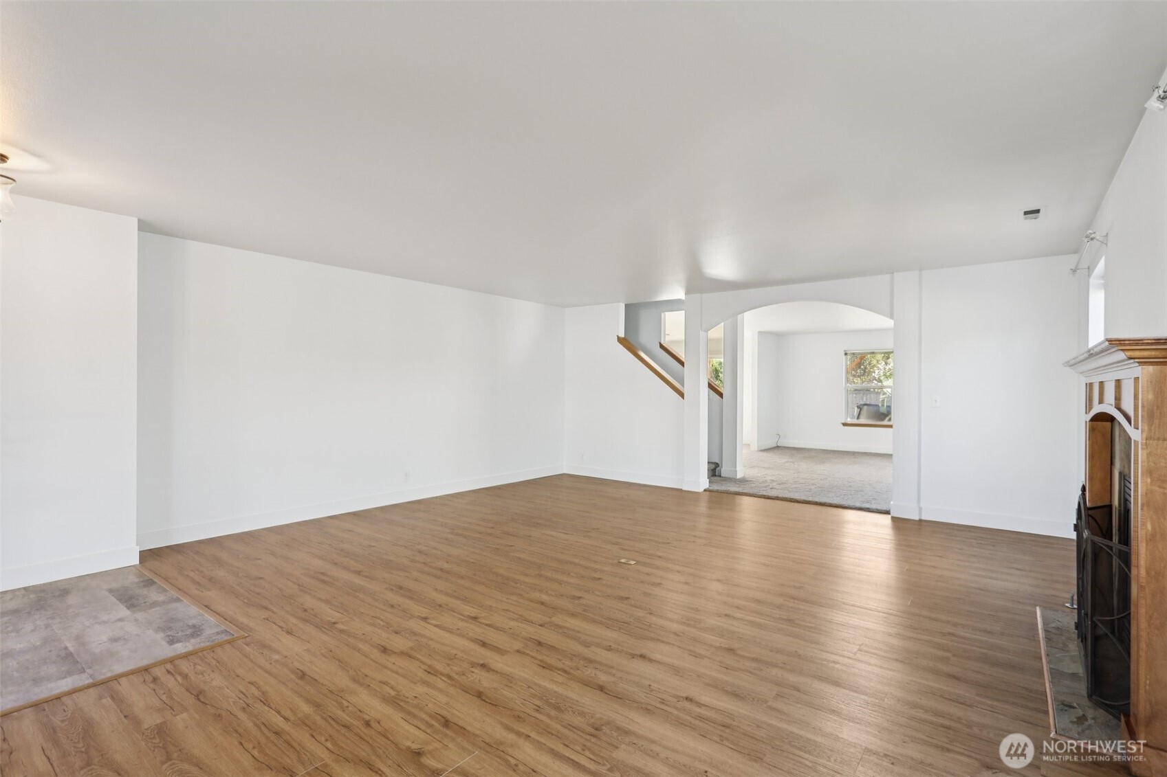 114 Weaver Street Northeast Orting, WA 98360 - Photo 5 of 40 a view of empty room with wooden floor