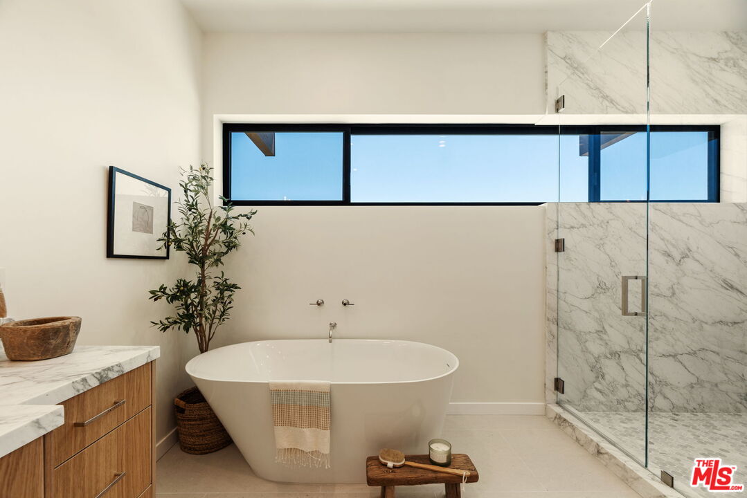 2165 Little Las Flores Road Topanga, CA 90290 - Photo 19 of 40 a bathroom with a sink and mirror