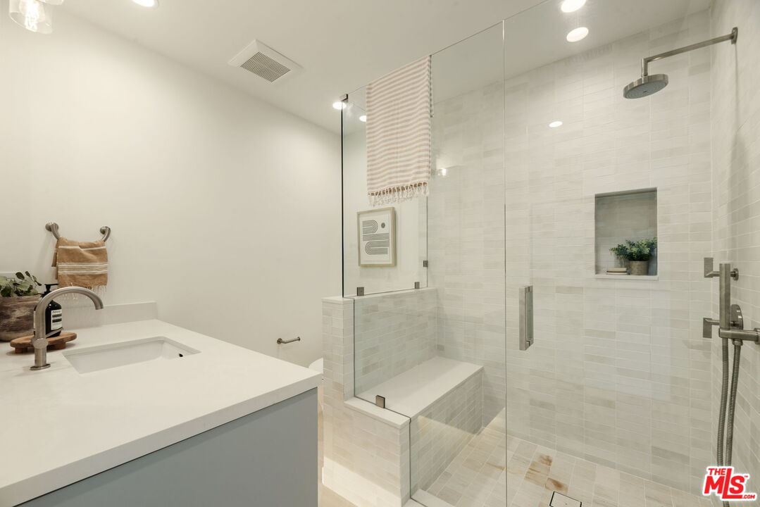 2165 Little Las Flores Road Topanga, CA 90290 - Photo 27 of 40 a bathroom with a sink and shower