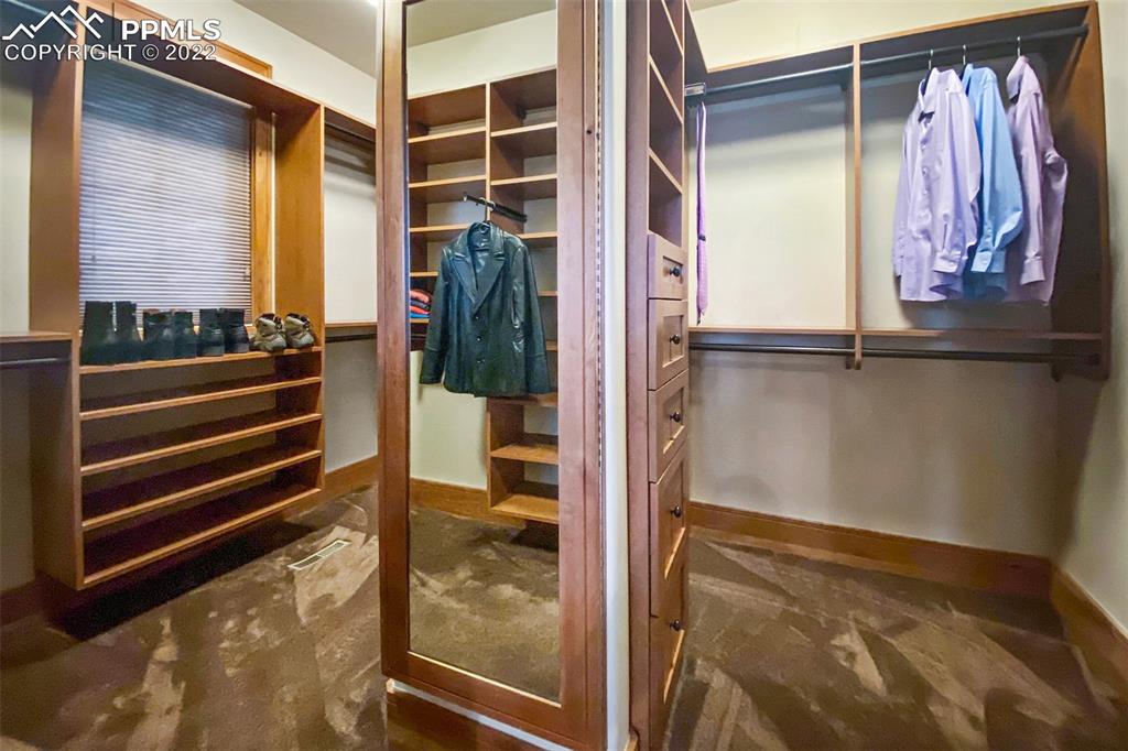 3833 Lorraine Road Larkspur, CO 80118 - Photo 15 of 40 a view of a walk in closet