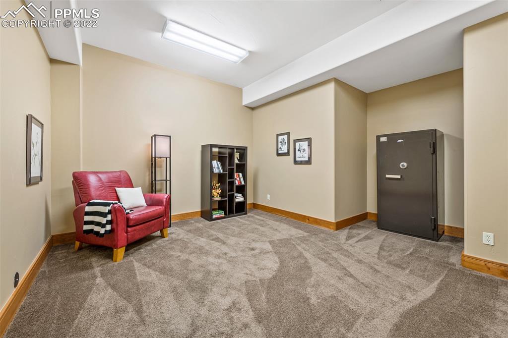 3833 Lorraine Road Larkspur, CO 80118 - Photo 22 of 40 a living room with furniture