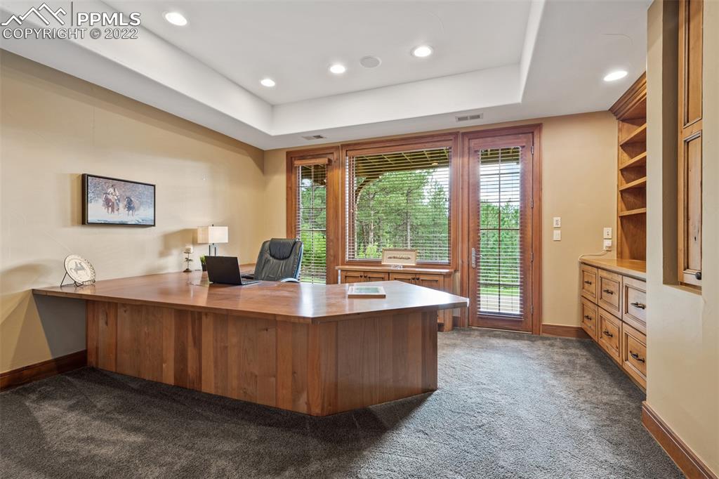 3833 Lorraine Road Larkspur, CO 80118 - Photo 23 of 40 a large kitchen with kitchen island a large window