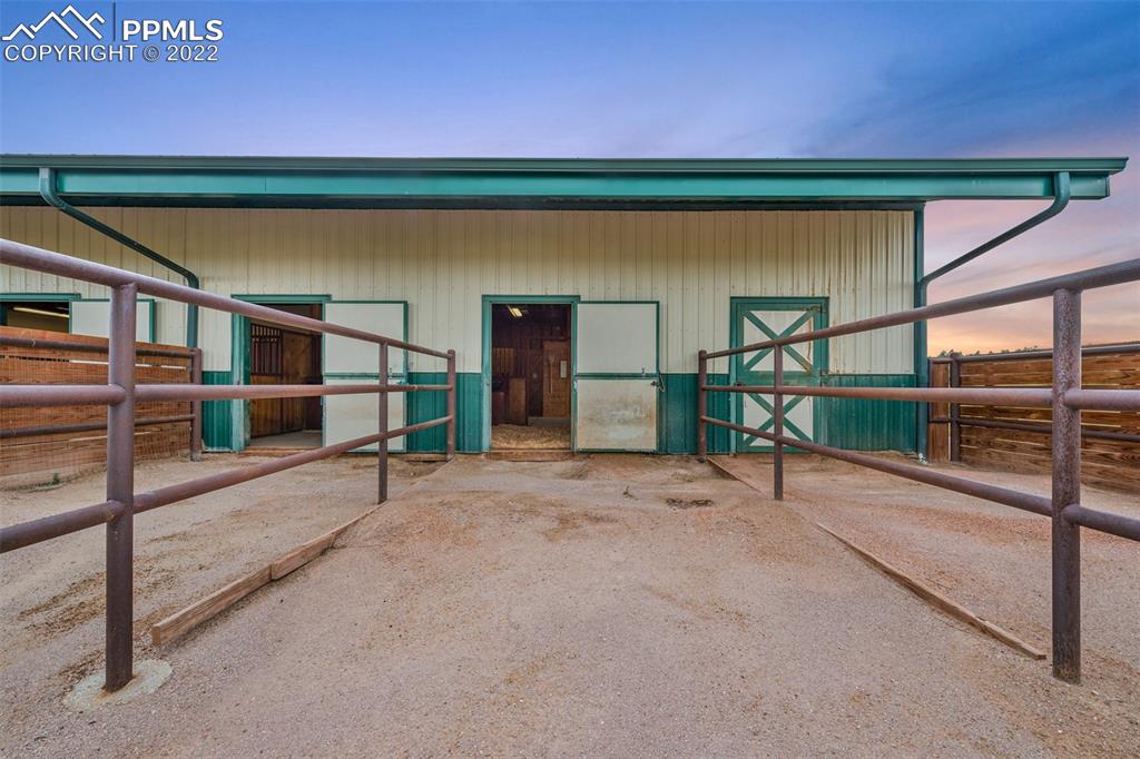 3833 Lorraine Road Larkspur, CO 80118 - Photo 38 of 40 a view of backyard with outdoor seating and city view