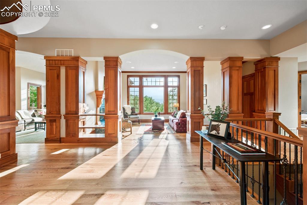 3833 Lorraine Road Larkspur, CO 80118 - Photo 4 of 40 a living room with furniture and large windows