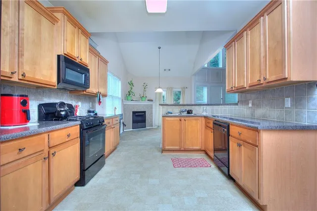 a bathroom with double sink and a mirror