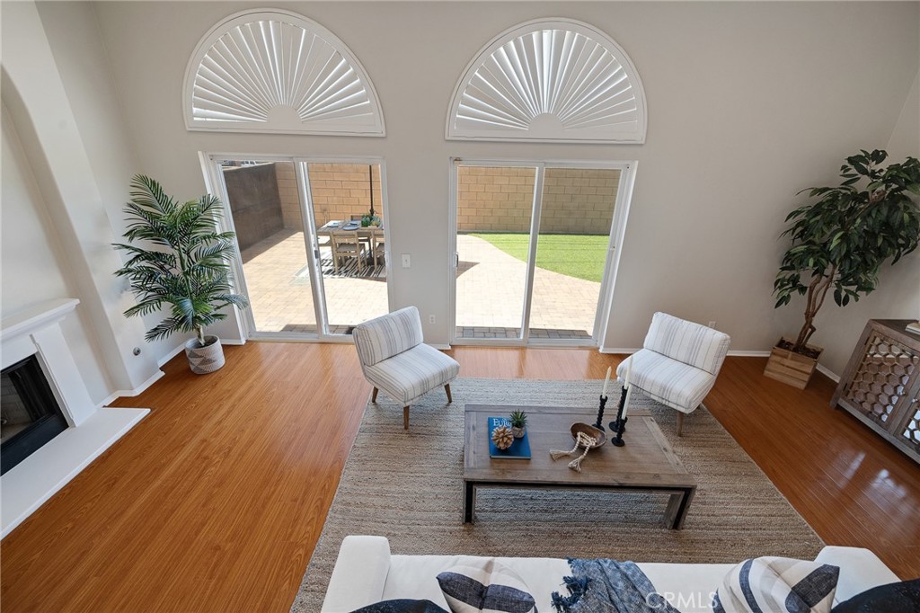 2786 Border Avenue Torrance, CA 90501 - Photo 12 of 47 a living room with furniture a fireplace and a potted plant