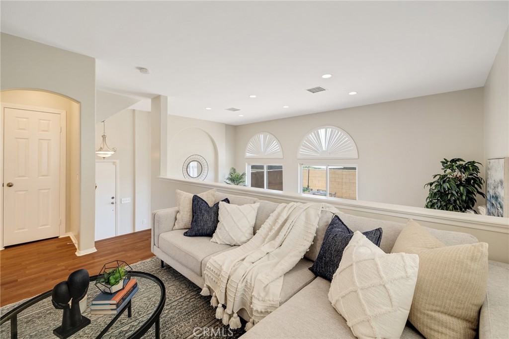 2786 Border Avenue Torrance, CA 90501 - Photo 14 of 47 a bedroom with a bed and wooden floor