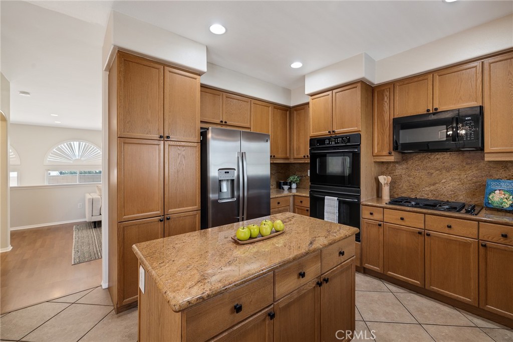 2786 Border Avenue Torrance, CA 90501 - Photo 20 of 47 a kitchen with stainless steel appliances granite countertop a refrigerator a stove and a sink