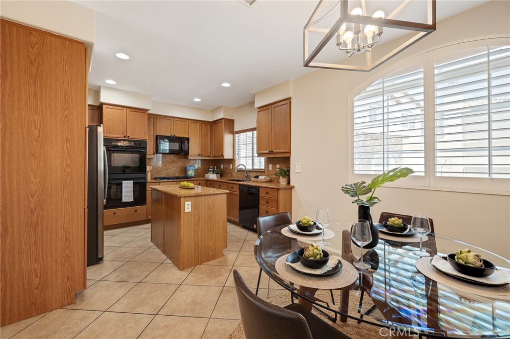 2786 Border Avenue Torrance, CA 90501 - Photo 25 of 47 a kitchen with stainless steel appliances granite countertop a stove a sink and a refrigerator