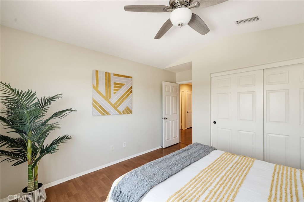 2786 Border Avenue Torrance, CA 90501 - Photo 28 of 47 a bedroom with a bed and a potted plant