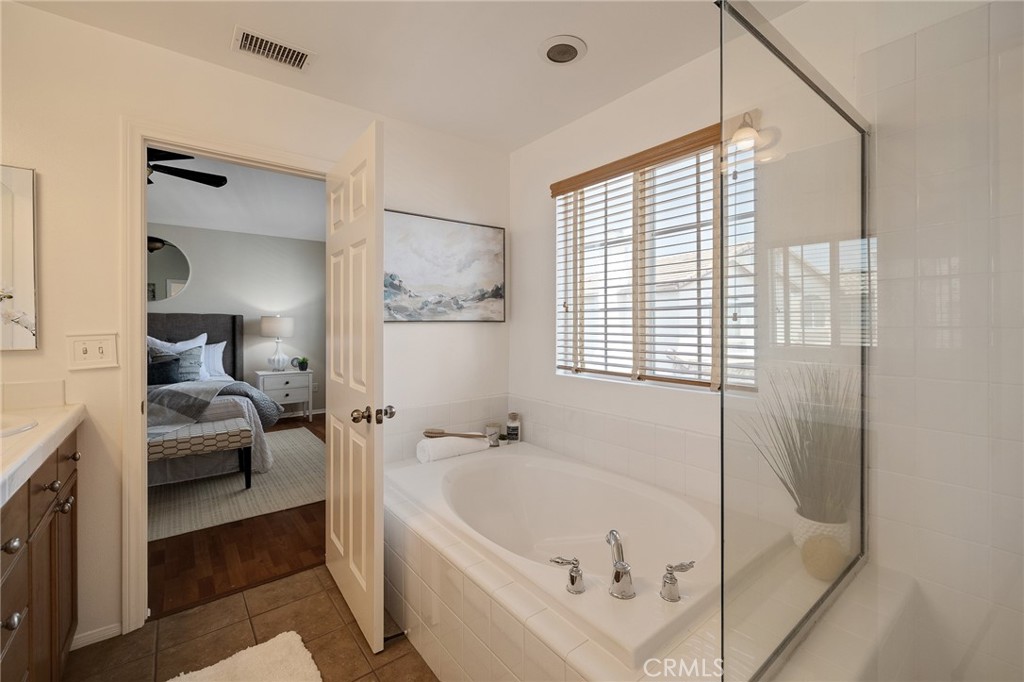 2786 Border Avenue Torrance, CA 90501 - Photo 41 of 47 a bathroom with a bathtub and a shower