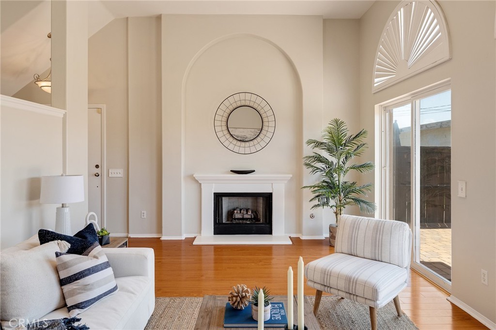 2786 Border Avenue Torrance, CA 90501 - Photo 6 of 47 a living room with furniture a fireplace and a potted plant