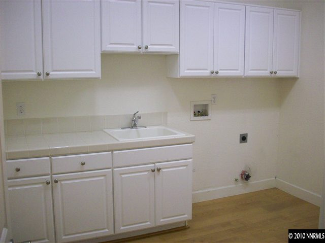 1696 Moquith Court Reno, NV 89521 - Photo 6 of 8 a view of cabinets and wooden closet